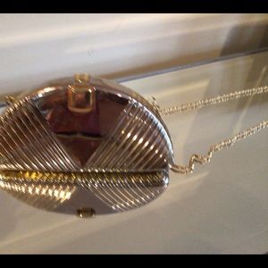 Metallic dress bag (hard exterior)